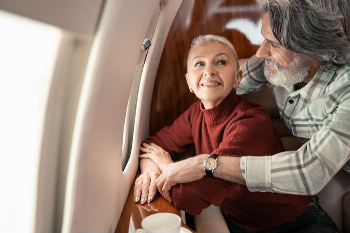 Older couple on plane