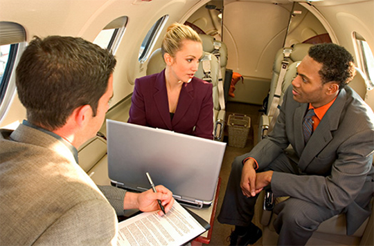business-meeting-on-a-plane